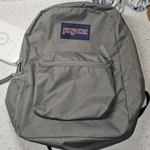 Jansport Superbreak Gray Backpack with Padded Straps and Durable Fabric